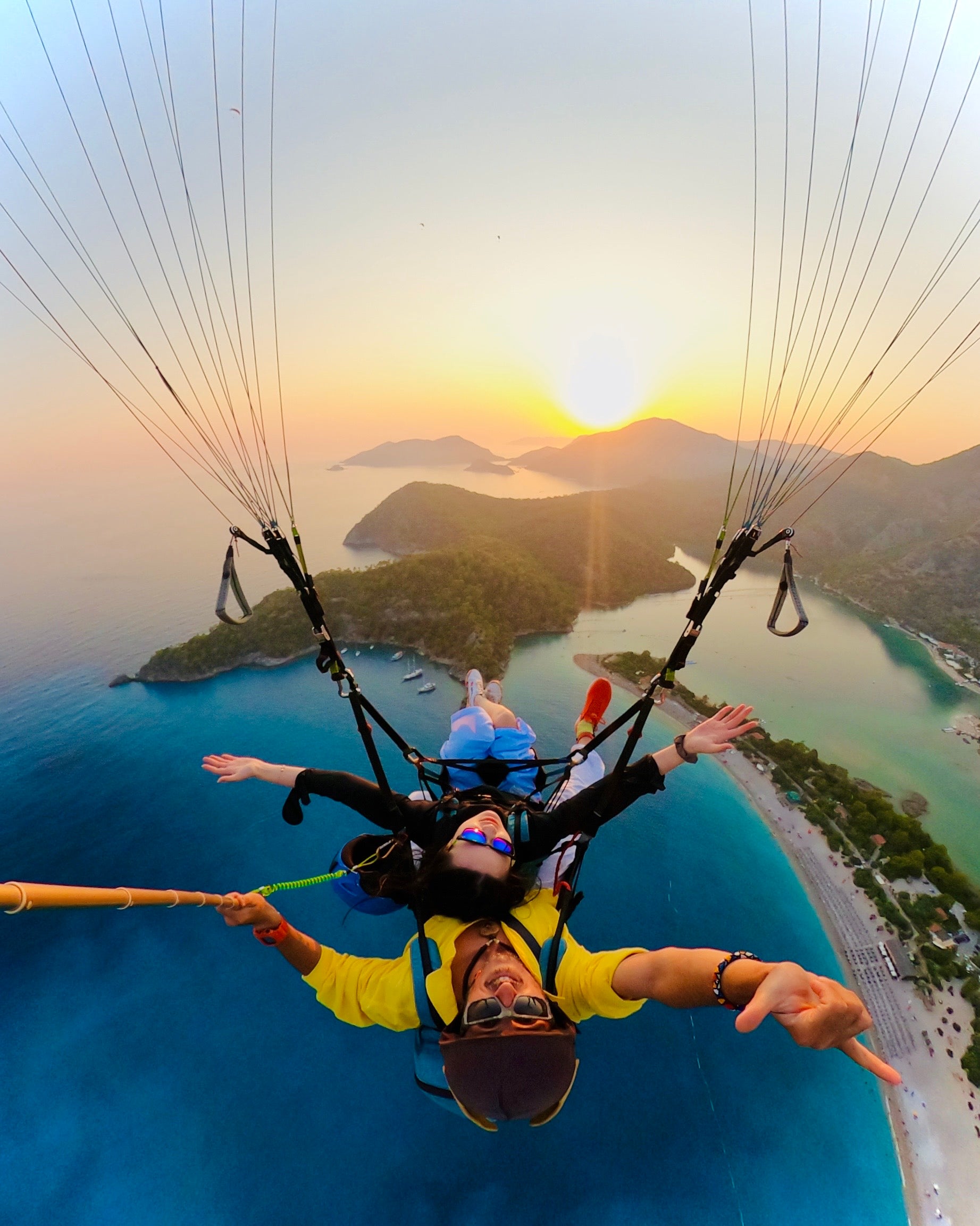 Tandem paragliding flight over Ölüdeniz lagoon in Fethiye